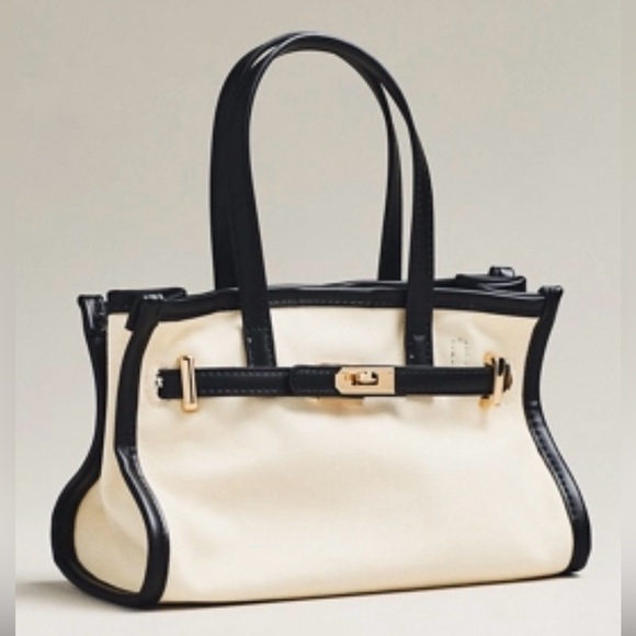 Anthropologie Handbags - Anthropologie Black and Cream Crossbody Bag NWT